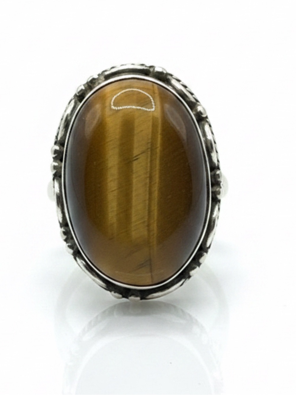 Oval Cabochon Tiger's Eye Gemstone Set In A Sterling Silver Setting Size 5